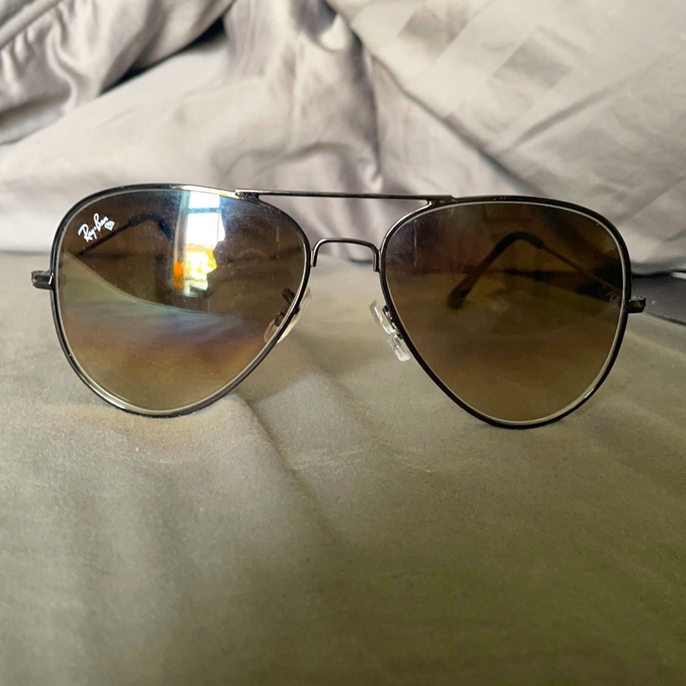 Brand new Ray Bans. Never worn, no scratches, comes with case and cleaning rag.